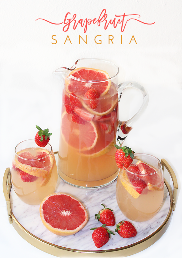 Grapefruit Sangria drink recipe with white wine, champagne, and a hint strawberry