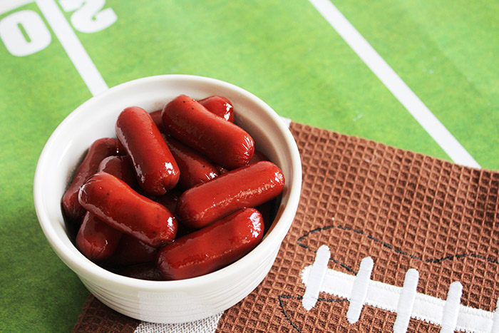 Slow Cooker Lit'l Smokies Recipe: Mini smoked sausages in a zesty barbecue and grape jelly sauce