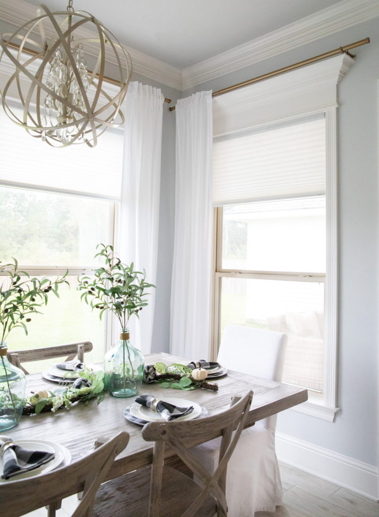 Light and Airy Dining Room with White Linen Curtains and Farmhouse Table