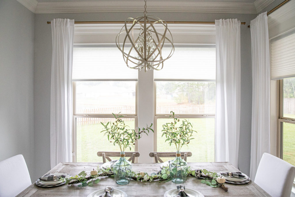 Grey Trestle Dining Table with Decor