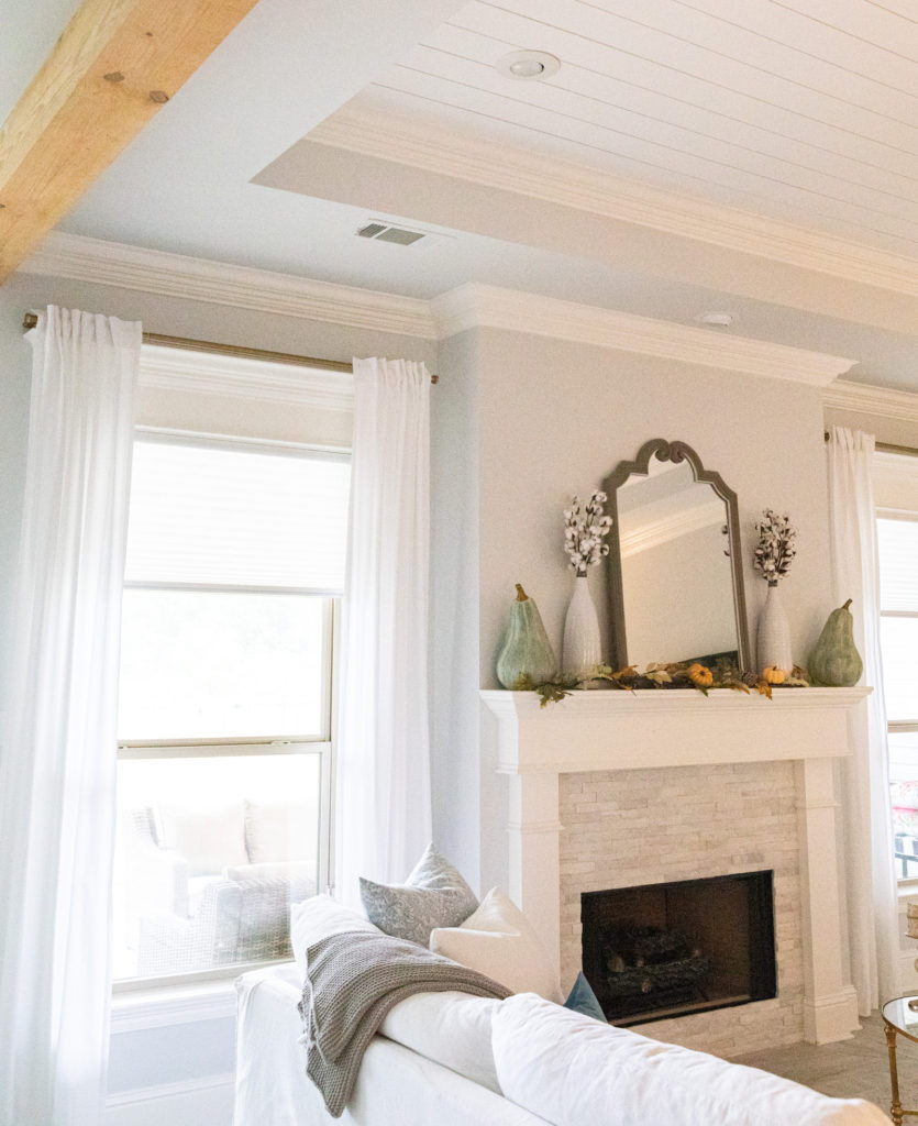 White Living Room with White Linen Drapes and White Sofa